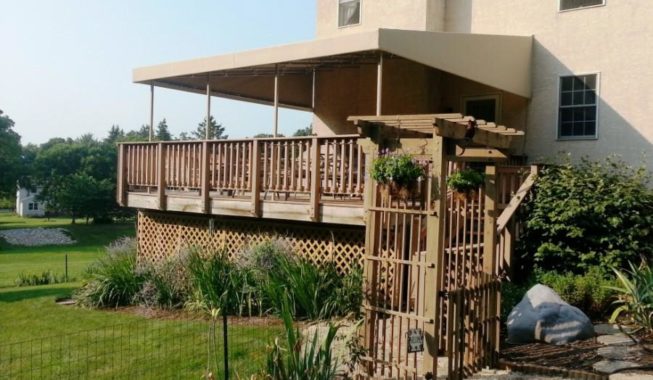 Outdoor wooden deck with awning